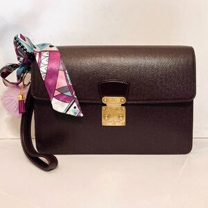 Louis Vuitton Taiga Kourad Wristlet Clutch Bordeaux